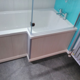 Bath panel made from wall panels